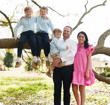 Family photo in front of a tree
