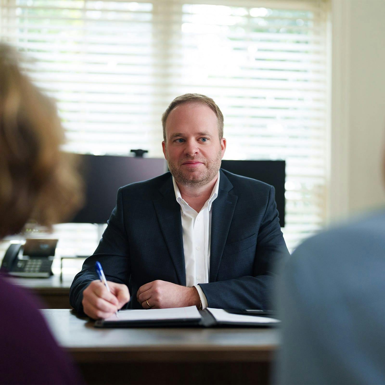 attorney talking to clients
