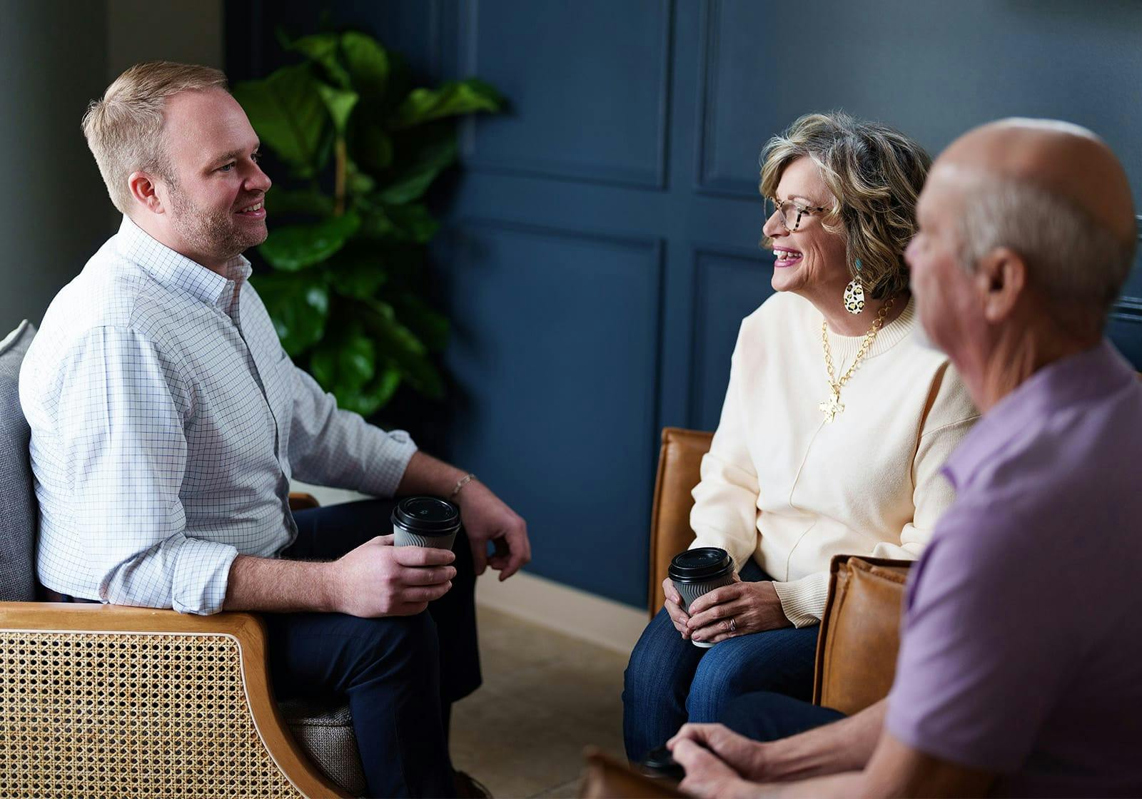 attorney talking to two clients