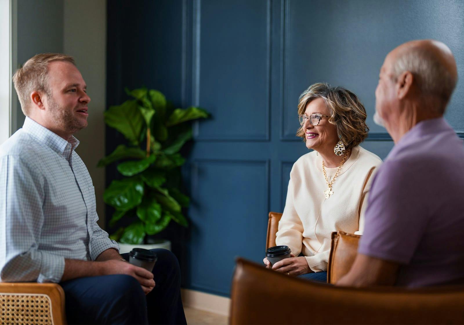 attorney talking to two clients
