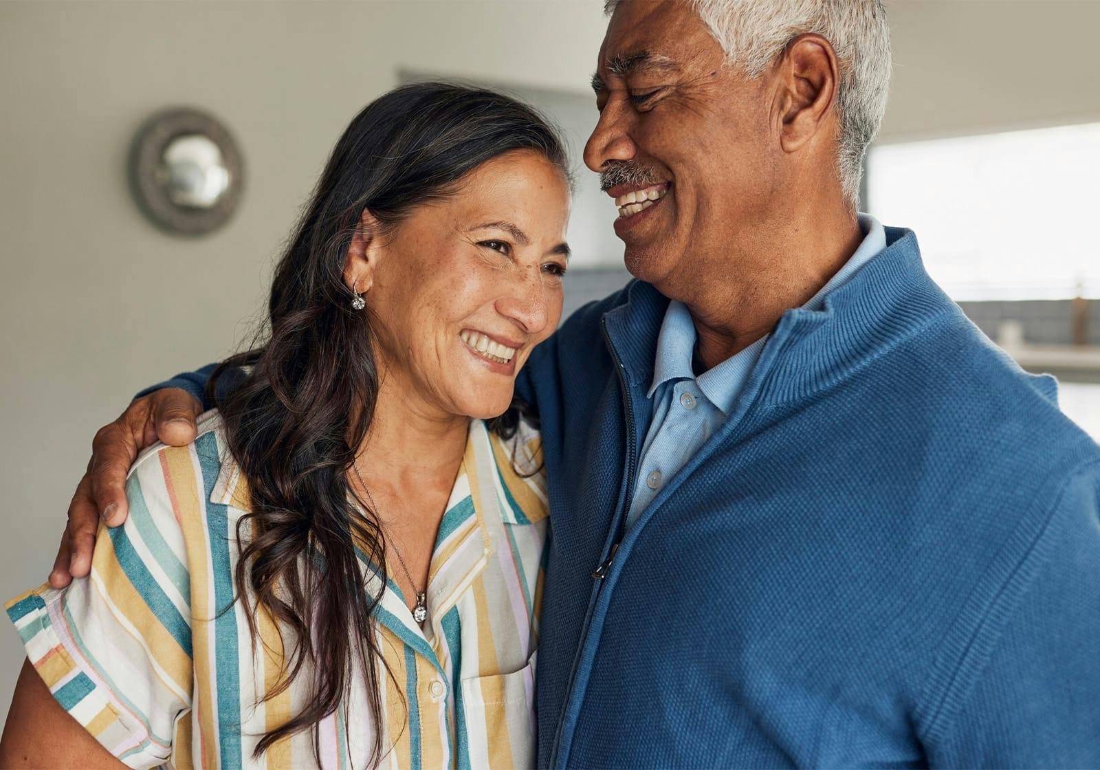 older couple hugging