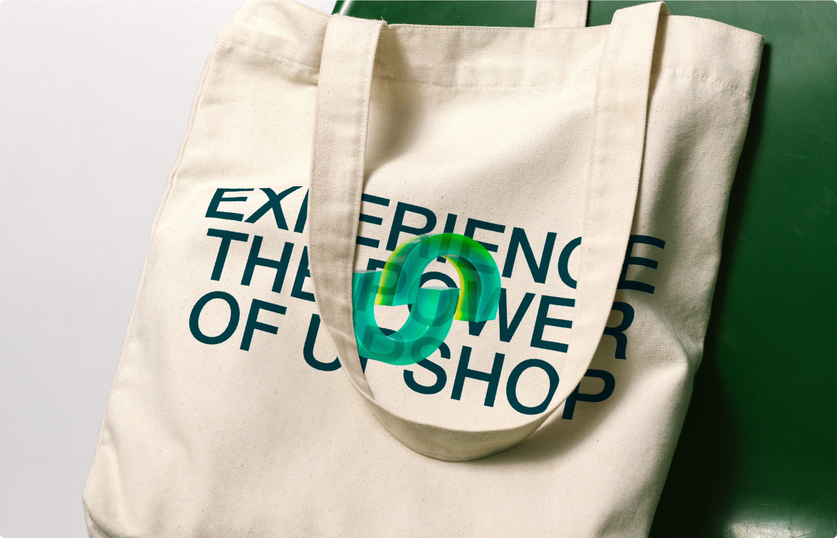 Branded Upshop tote bag featuring modern typography and logo design from Griflan’s identity system.