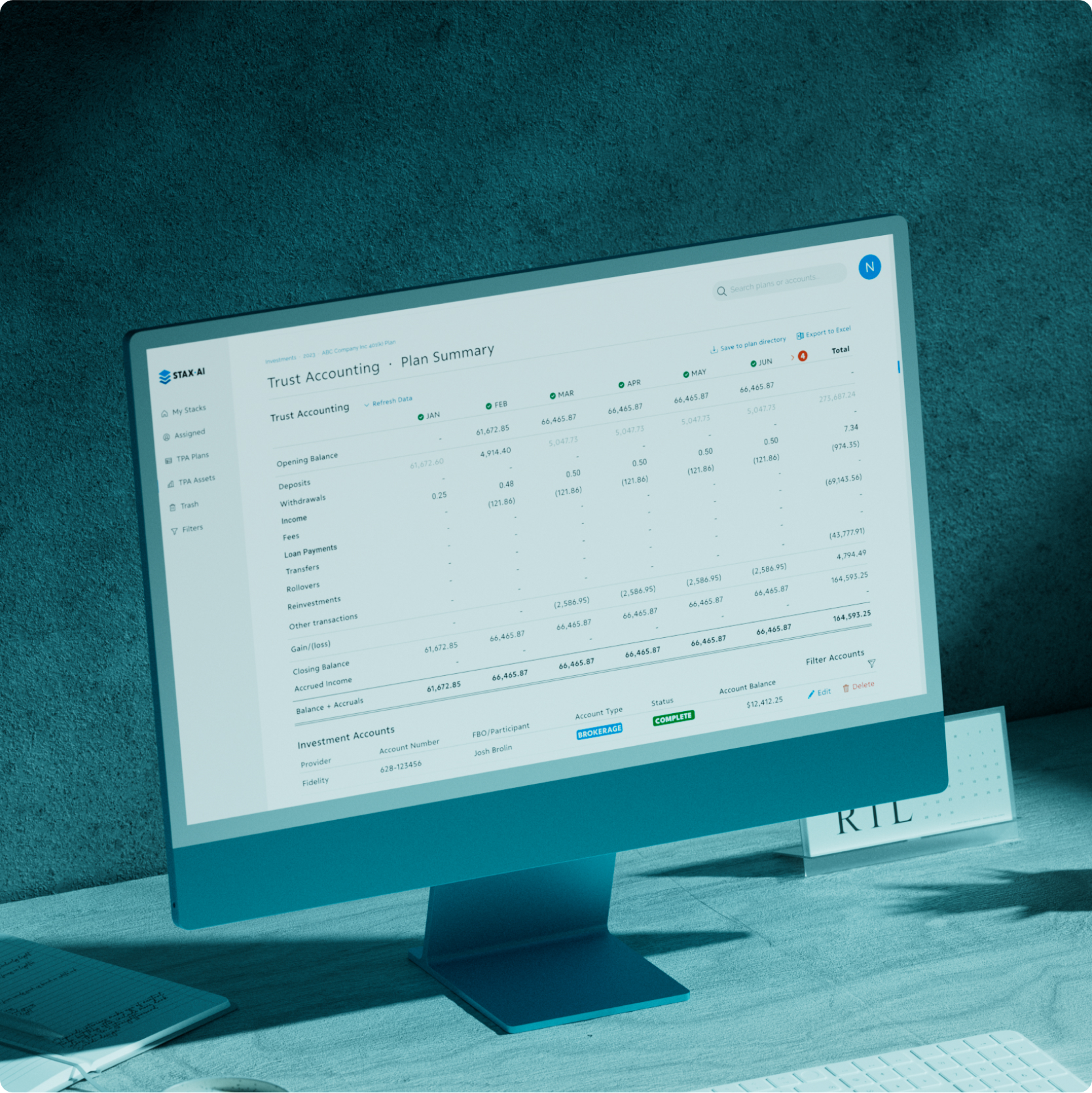 Computer displaying detailed Stax.ai web page design and user interface layout.