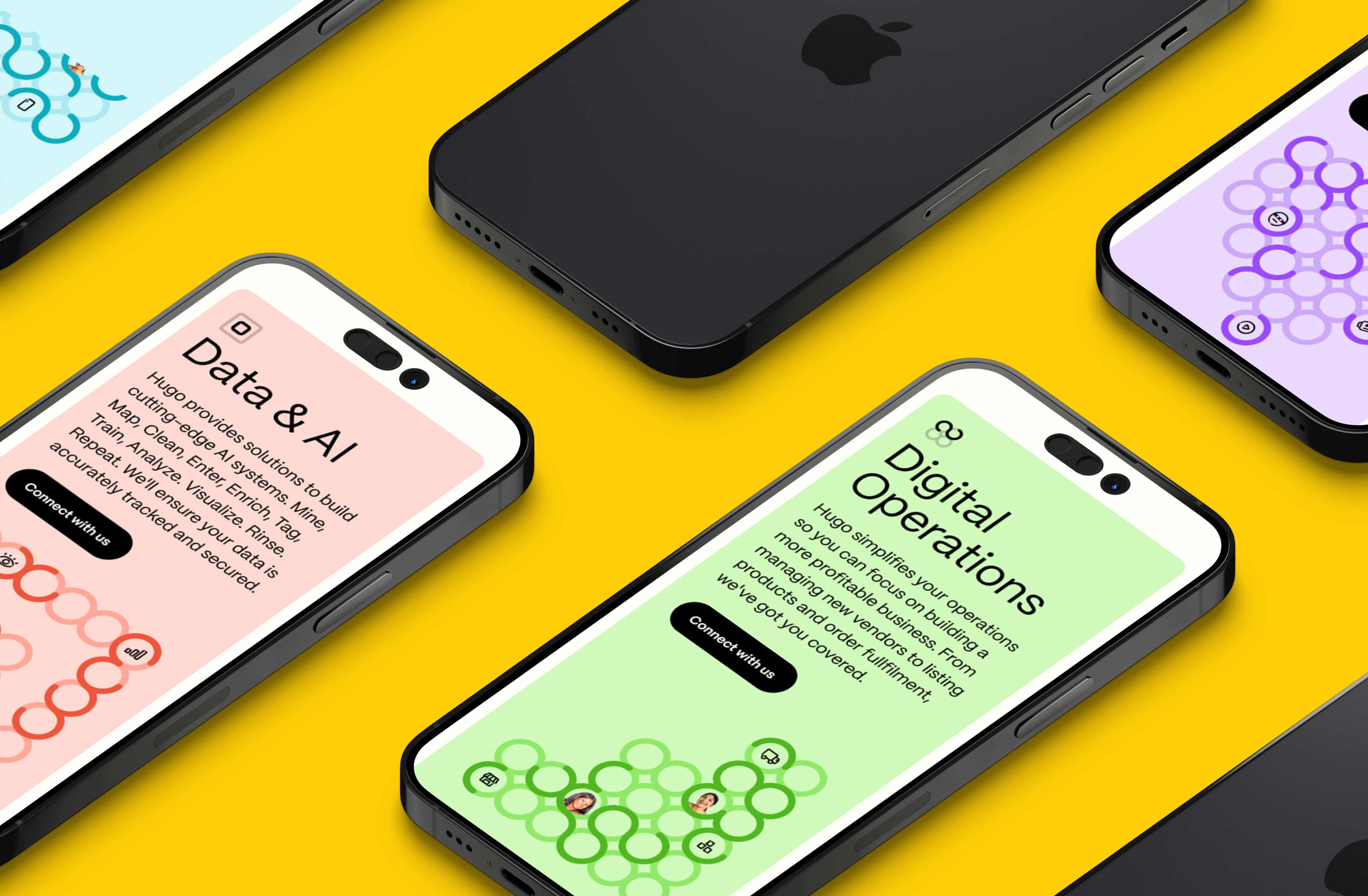 Green and yellow Hugo mobile screens arranged on a bright surface.