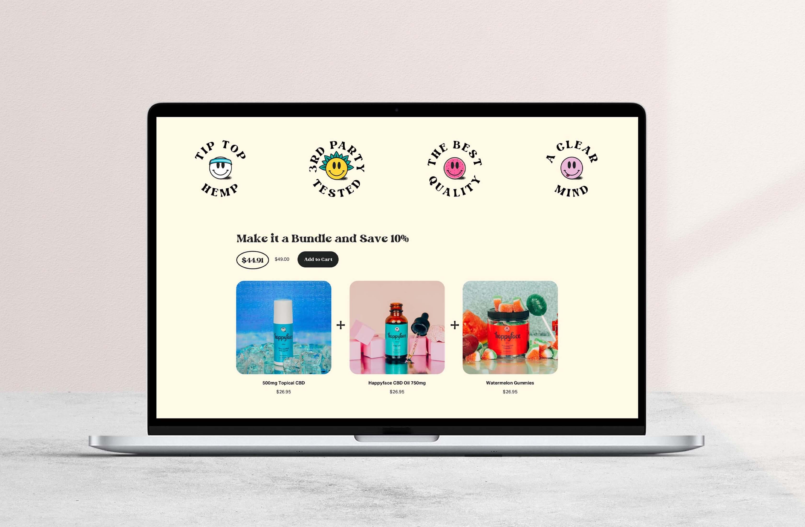 Happy Face homepage design displayed on a laptop mockup.