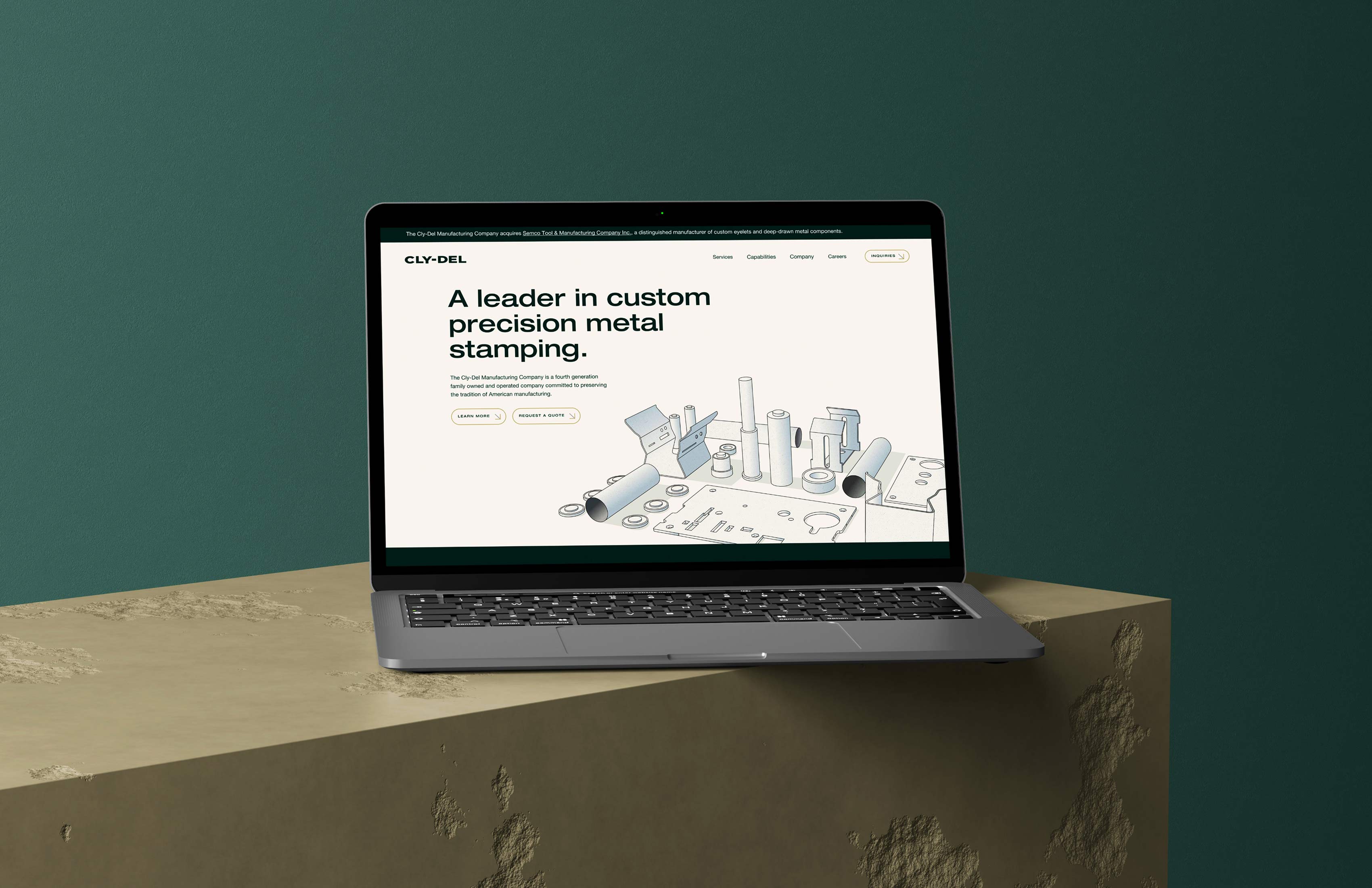 Laptop showing Cly-Del website.