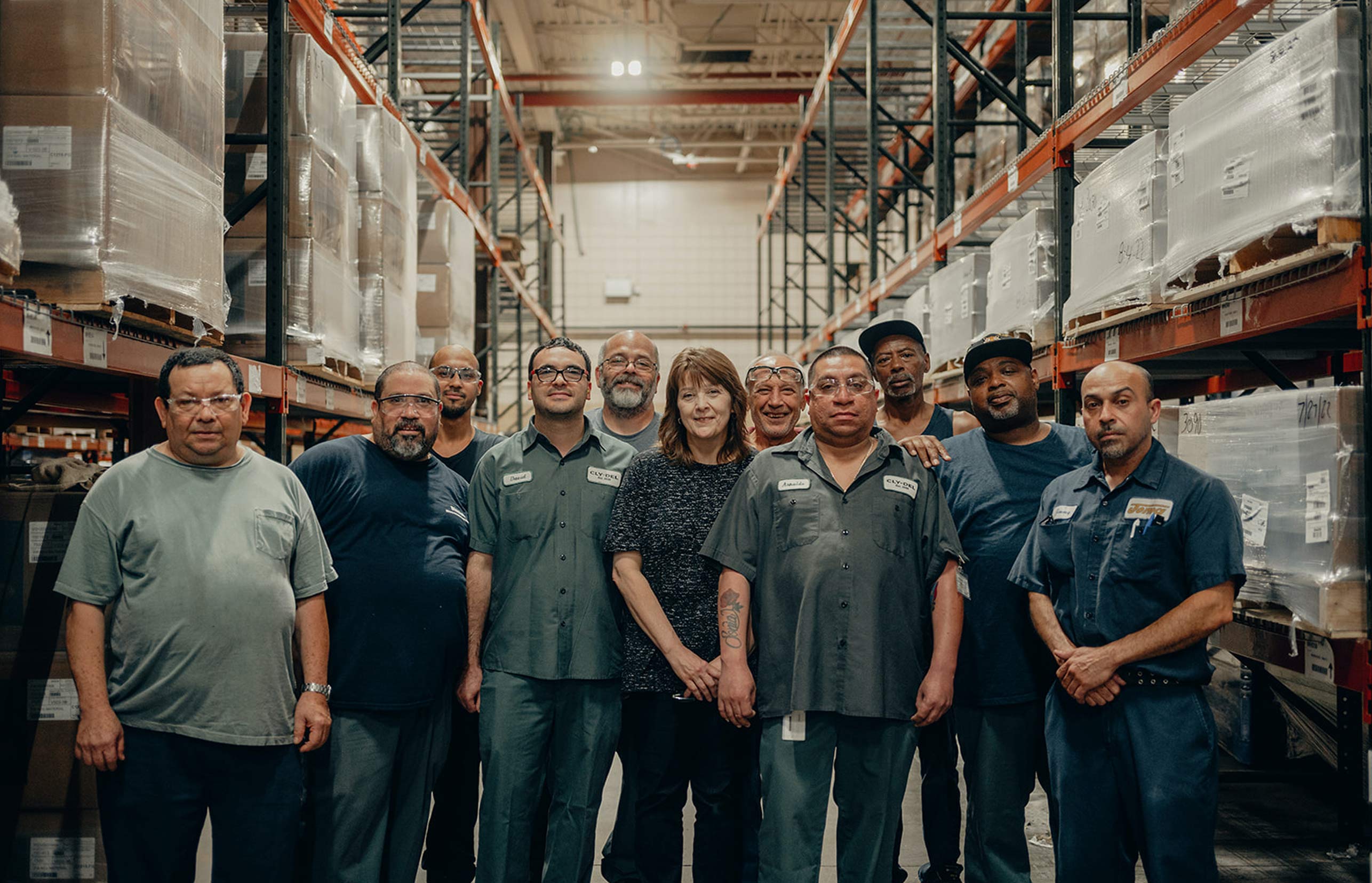 Cly-Del team photo taken on the manufacturing floor.