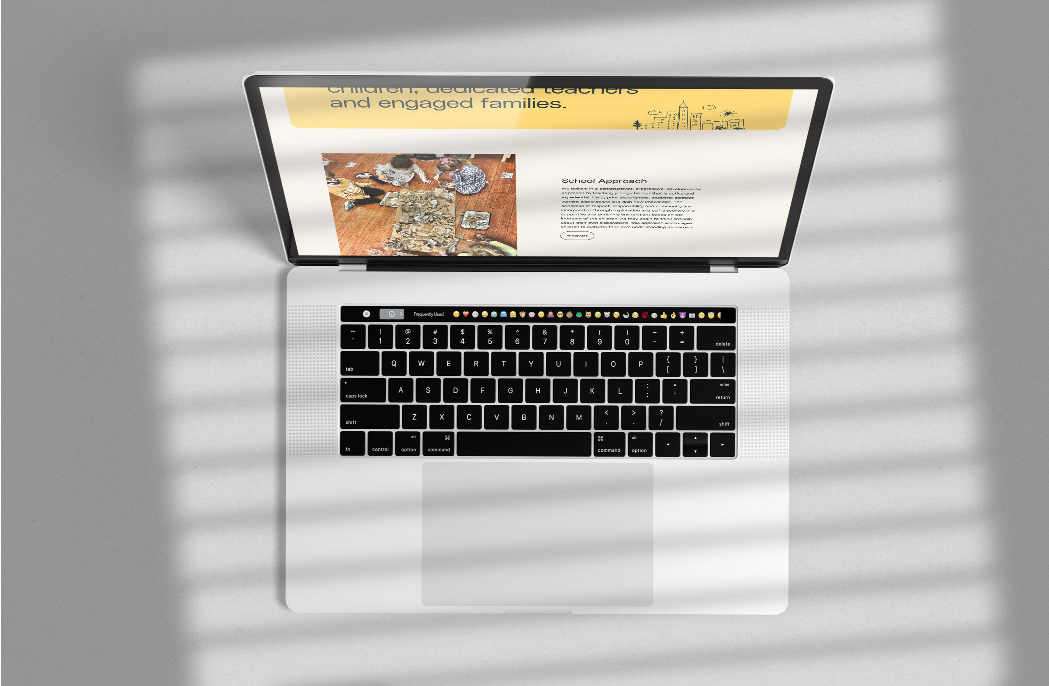 Laptop displaying the Barrow website homepage with clean layout and civic branding.