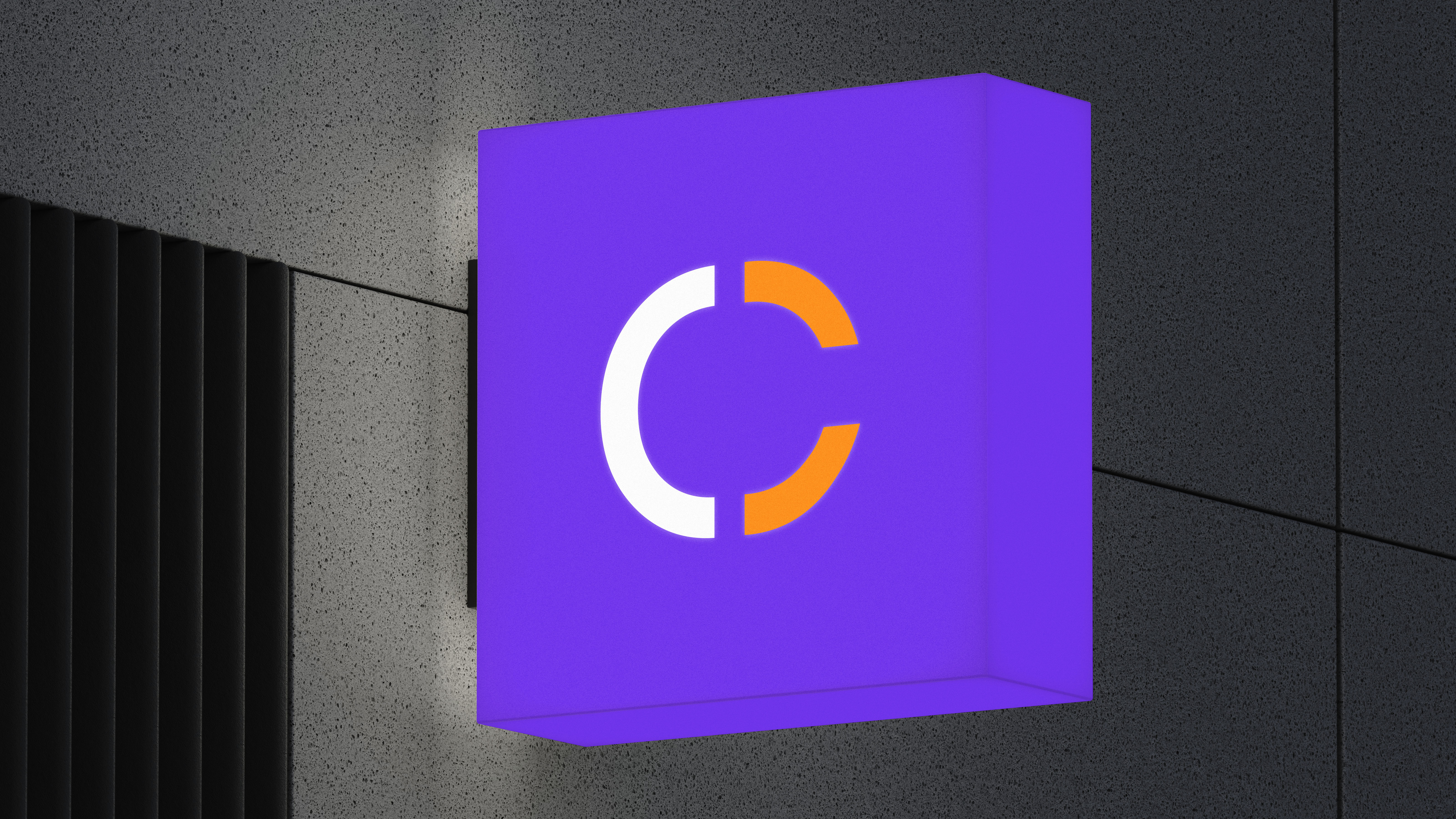 Purple lightbox sign featuring Conjura logo symbol mounted on textured grey wall of sleek, modern building exterior