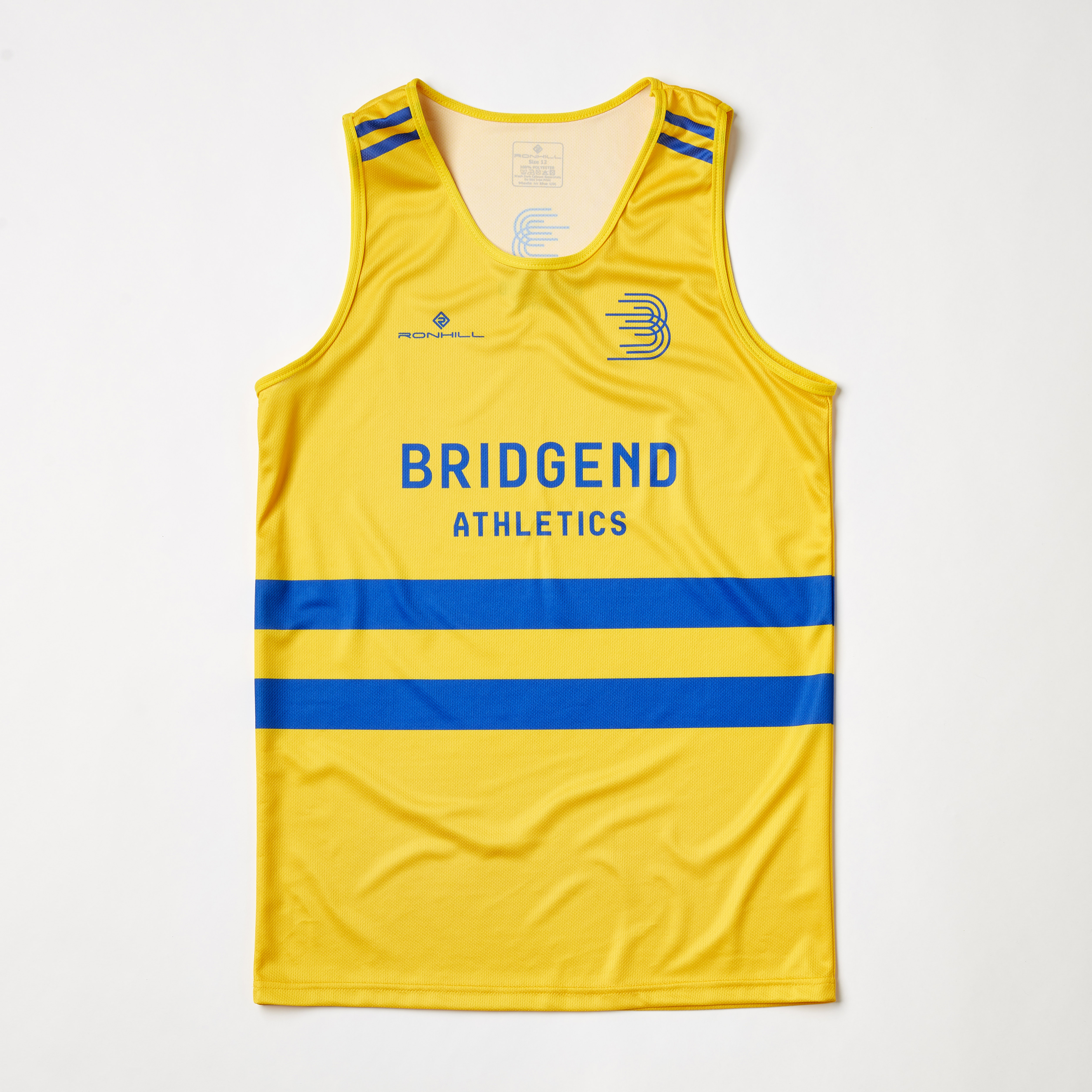 Front of Bridgend Athletics bright yellow and blue sports jersey on bright studio background