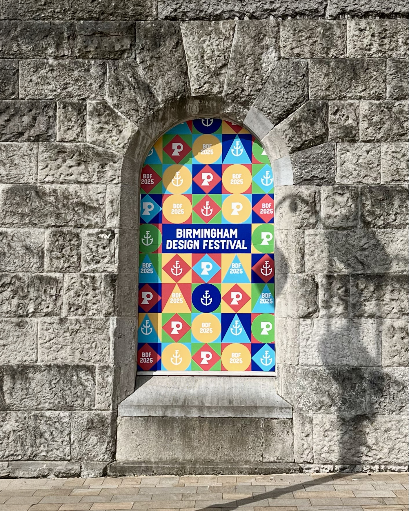 Birmingham Design Festival 2025 vinyl branding displayed in venue window, highlighting event identity and design focus