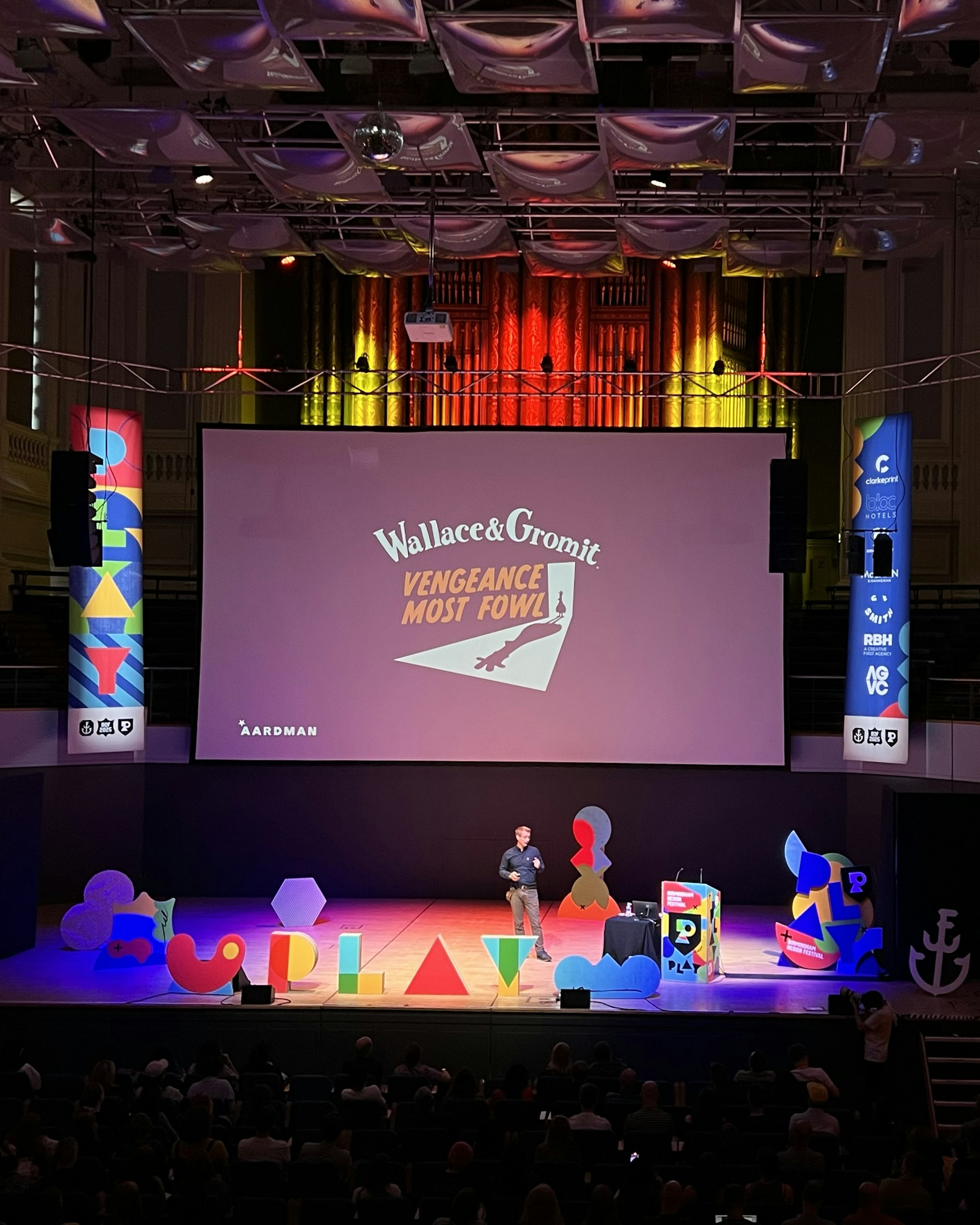 Merlin Crossingham from Aardman speaking at Birmingham Design Festival 2025 on play in design and creative production