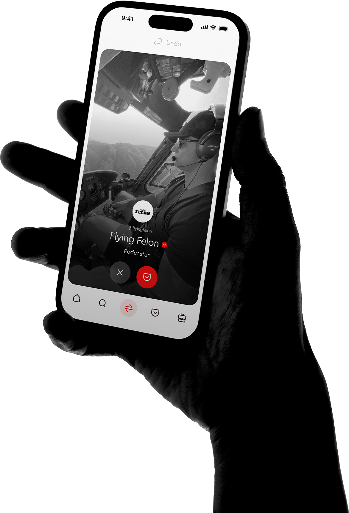 Person holding a smartphone displaying a Pocketchange app profile screen for 12 Studio, a digital marketing agency, featuring two men sitting and smiling in a modern, minimal interface.