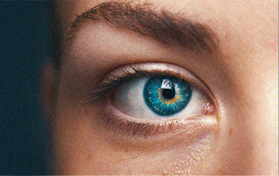 Close up image of a bright blue eye
