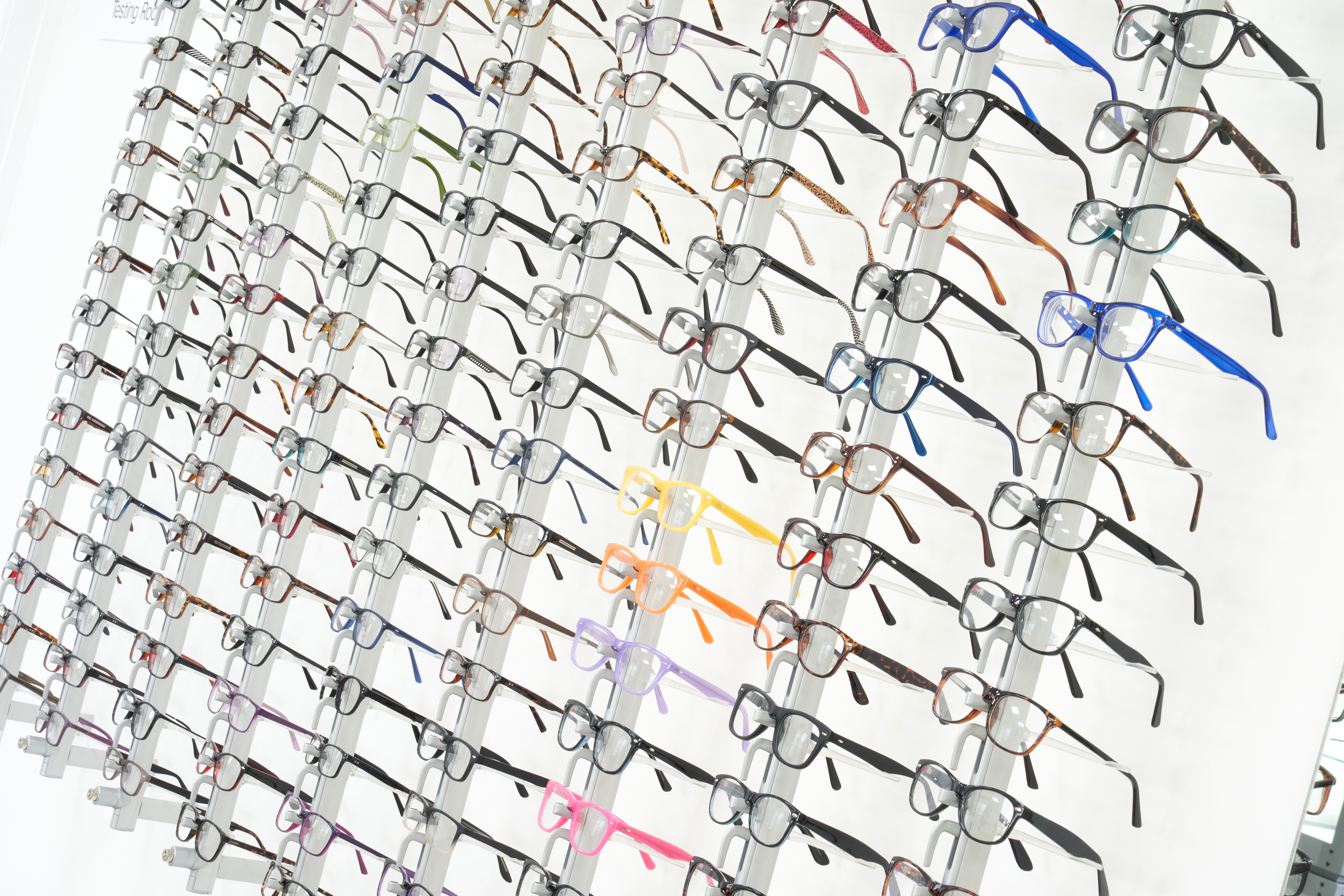 Rows of glasses in direct sight shop