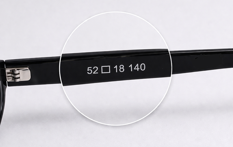 Magnified measurements on the inside of a glasses frame arm