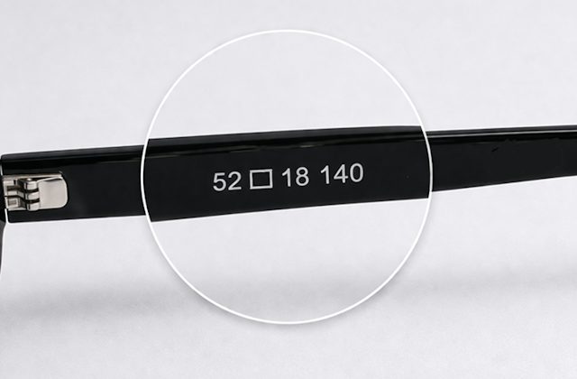 Magnified measurements on the inside of a glasses frame arm