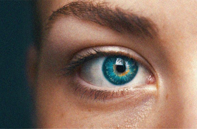 Close up image of a bright blue eye