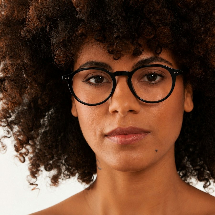 Woman wearing black plastic