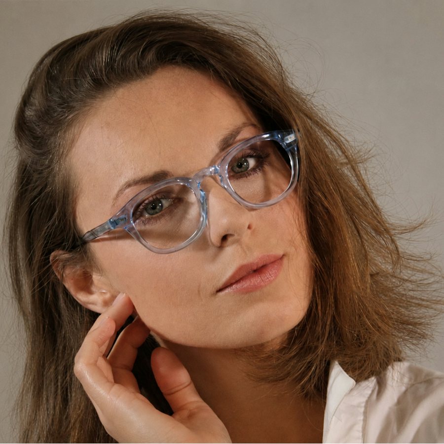 Attractive woman wearing ligh blue glasses