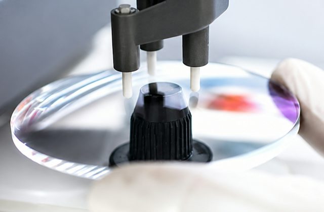 Prescription being checked on an optical lens