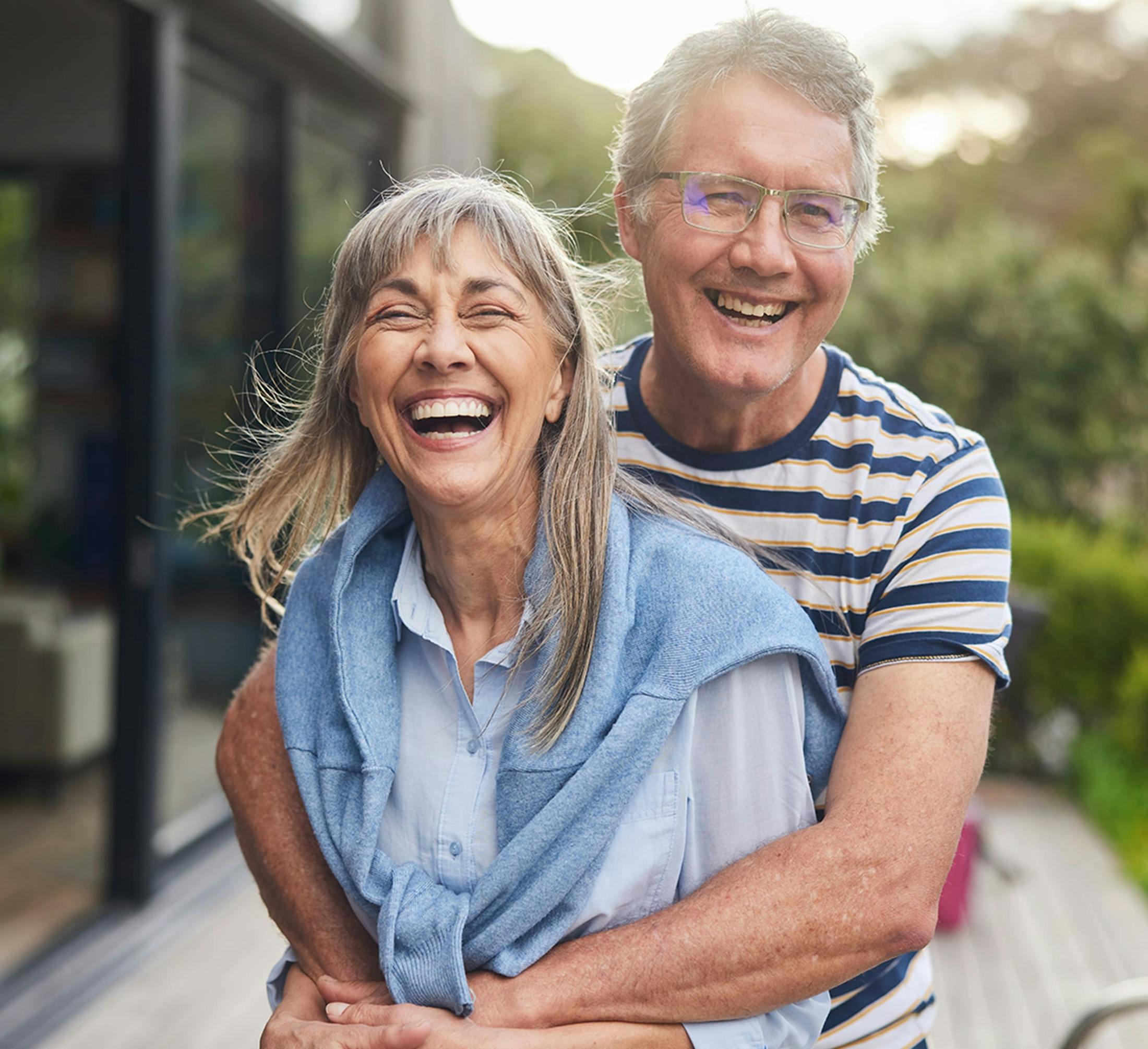 older couple hugging eachother