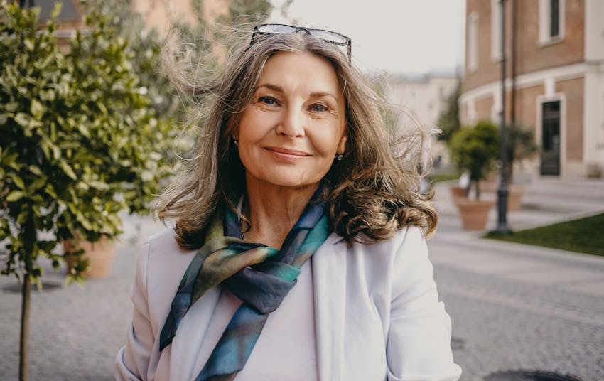 woman outdoors smiling