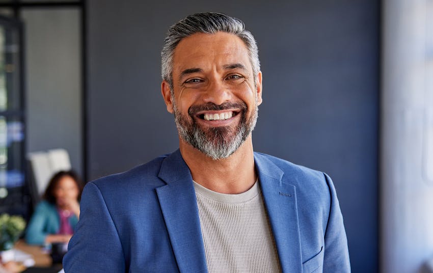 man in a blue suit jacket