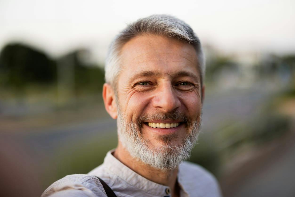 Bearded man smiling