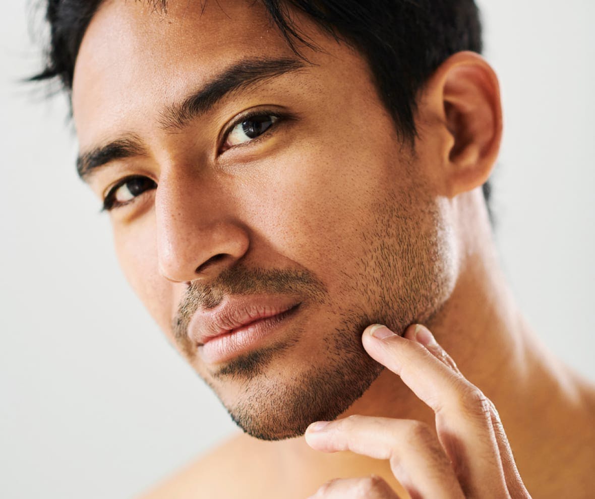 close up of man showing the side of his jaw