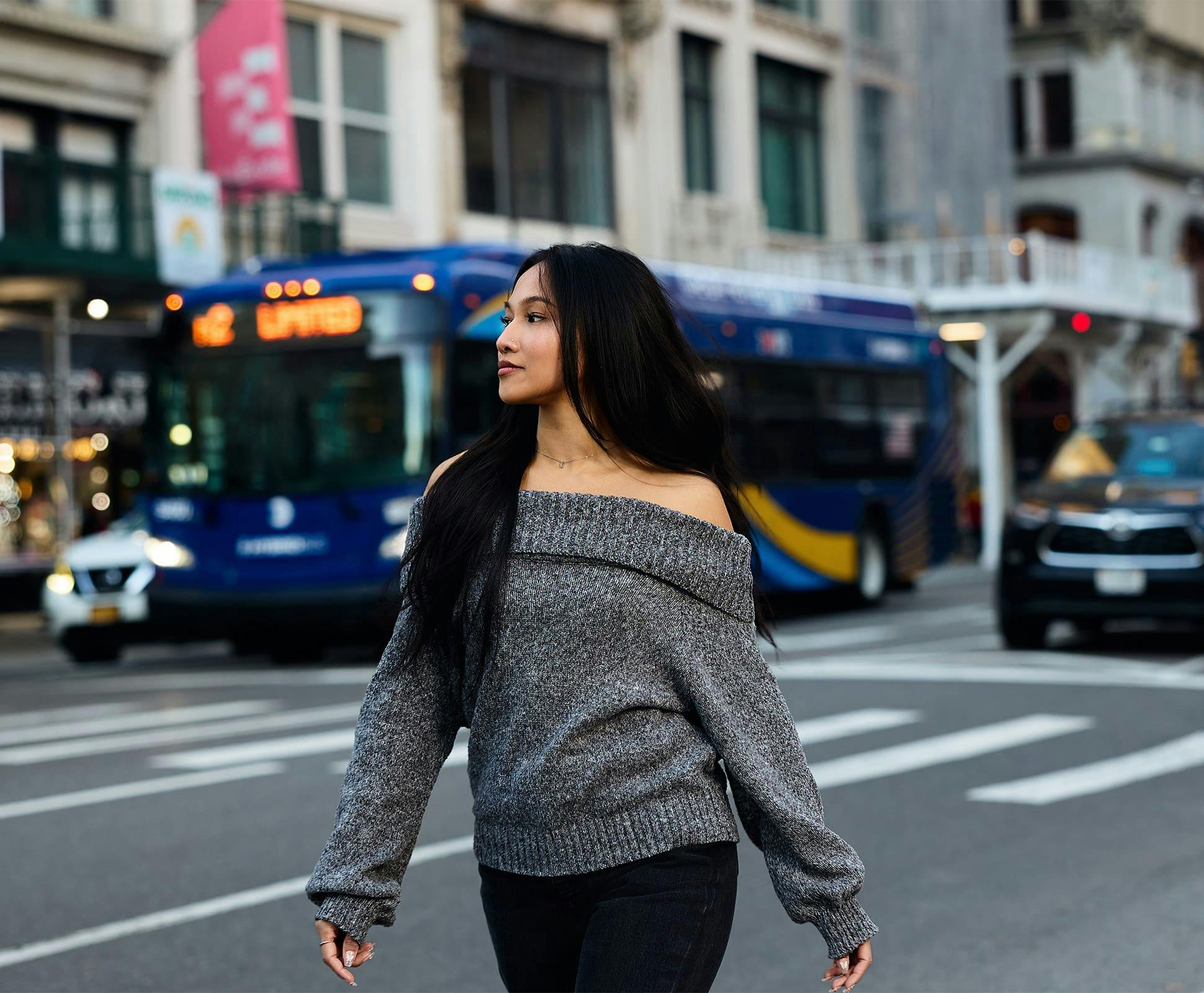 woman walking on city street
