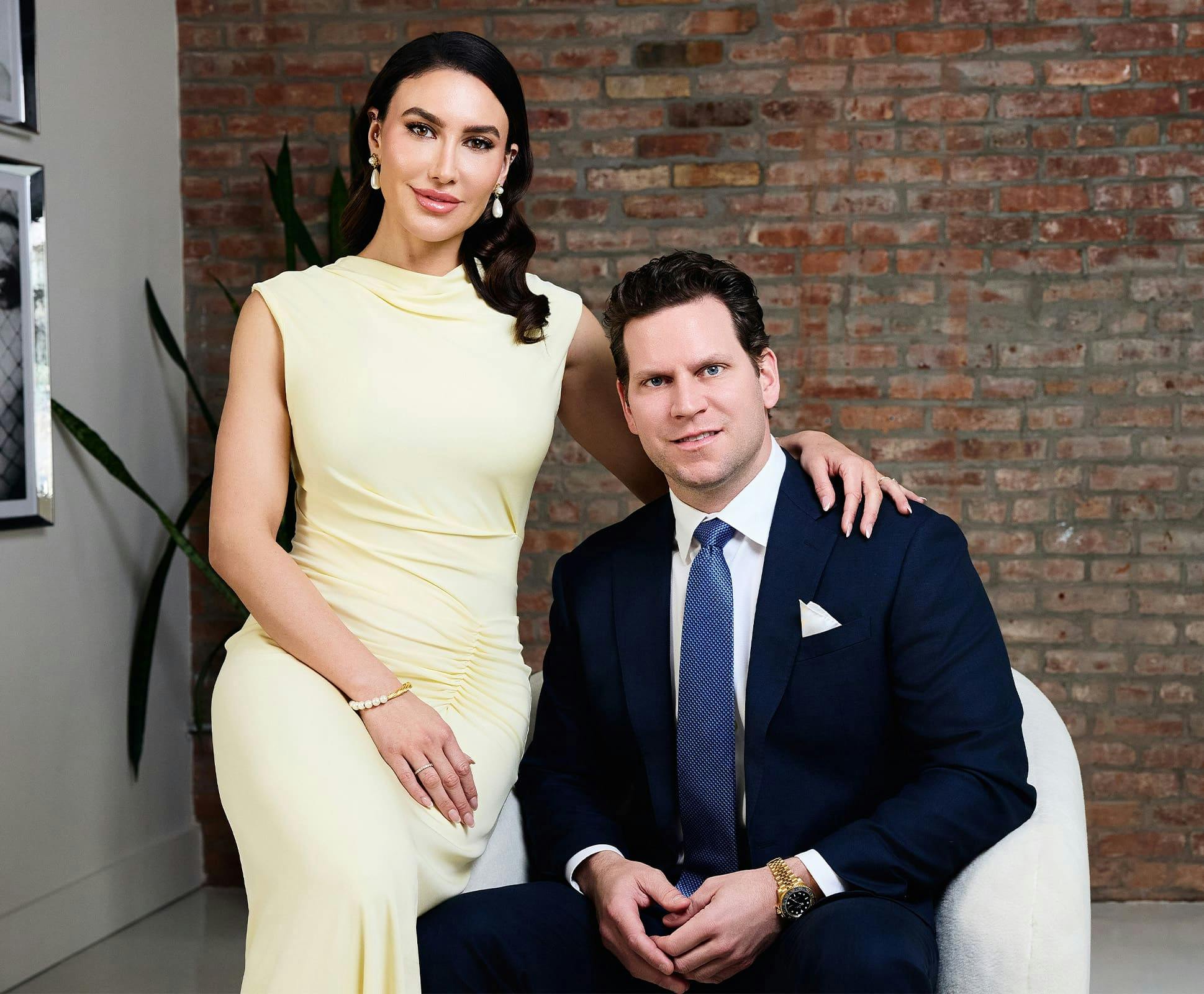 Both Mariesa Porter and Dr. David Porter sitting together in professional attire