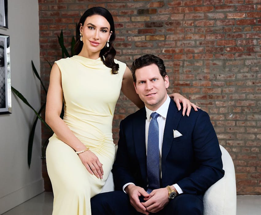 Both Mariesa Porter and Dr. David Porter sitting together in professional attire