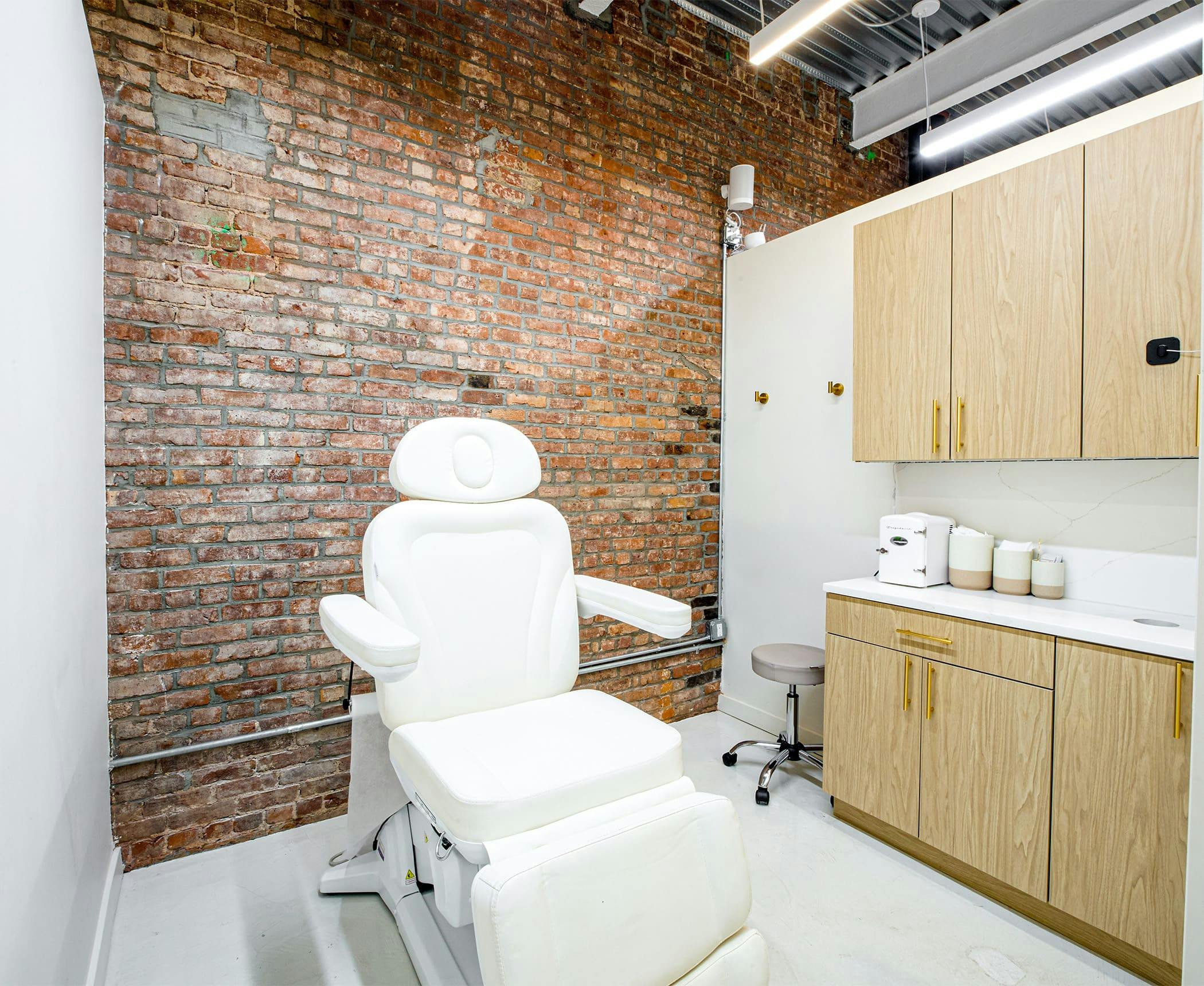 Examination room with white chair in the center