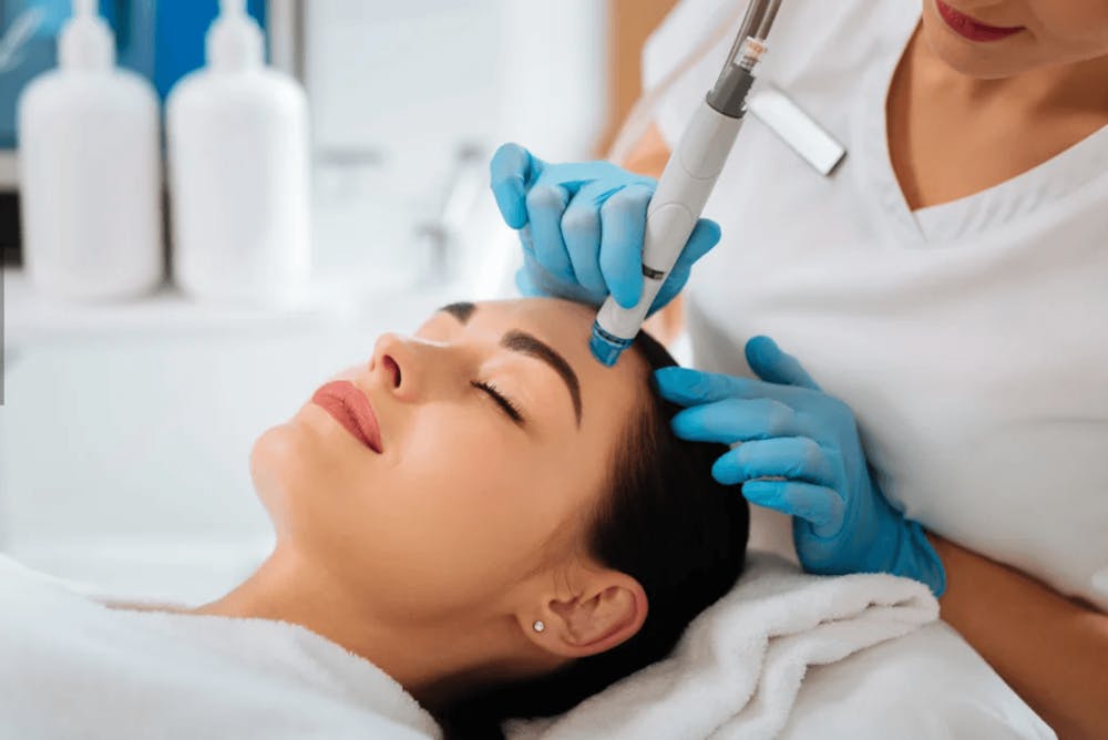 woman getting a face treatment