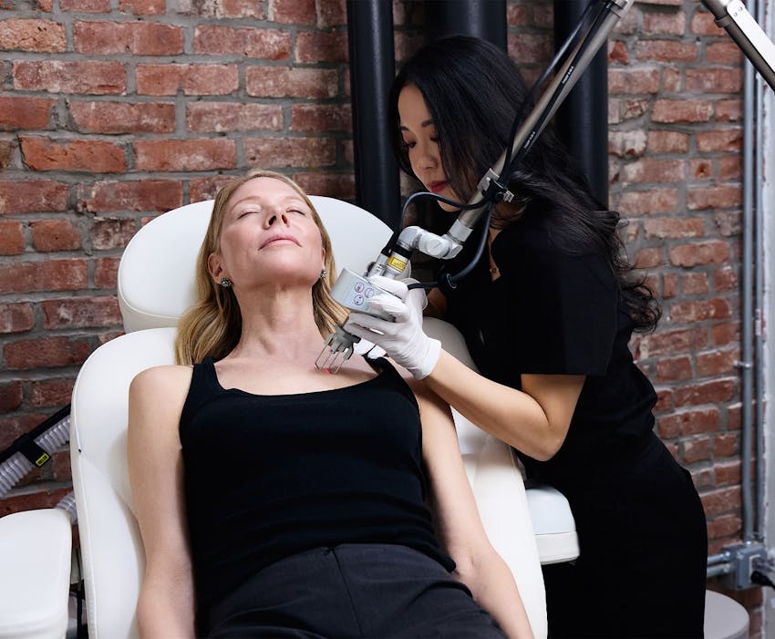 woman getting laser treatment from Chelsea