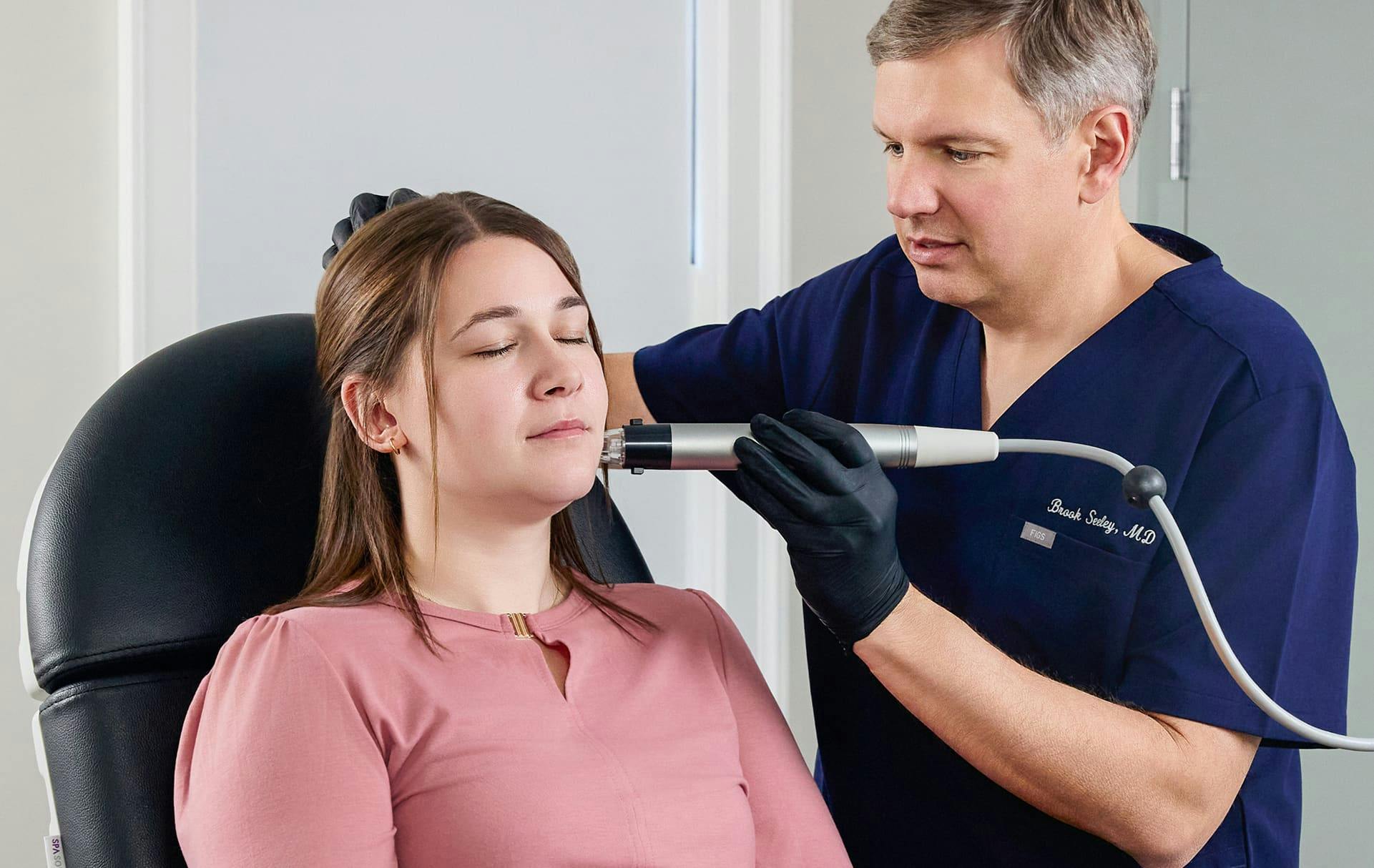 Woman and doctor during treatment