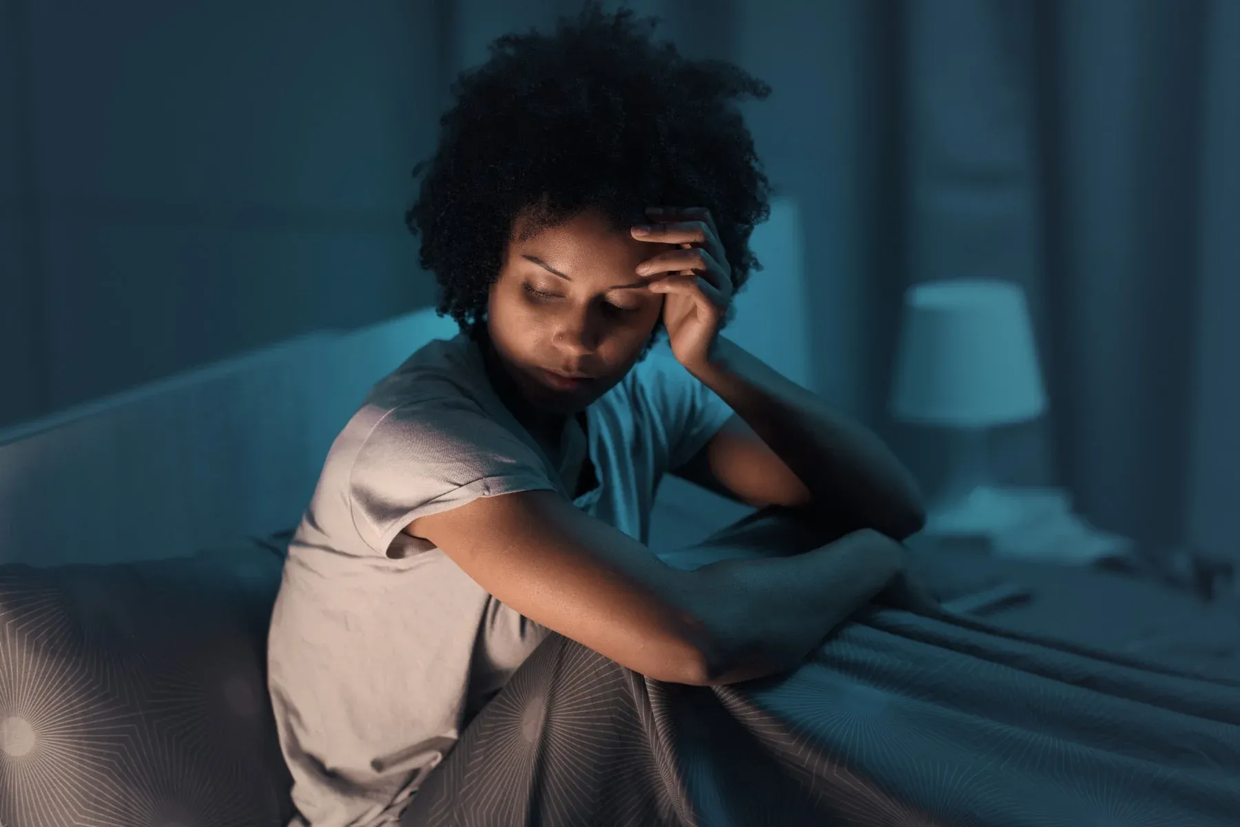 a women struggling with fragmented sleep