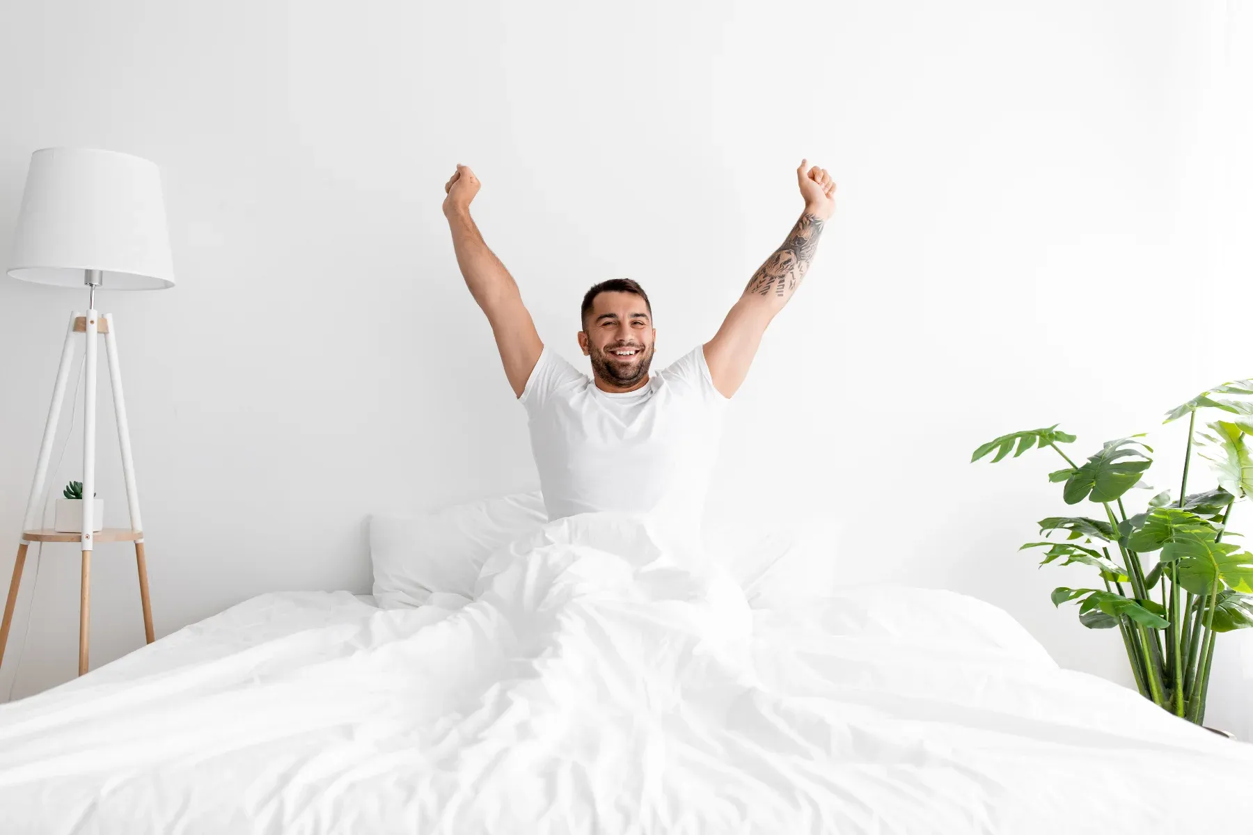 Man waking up refreshed