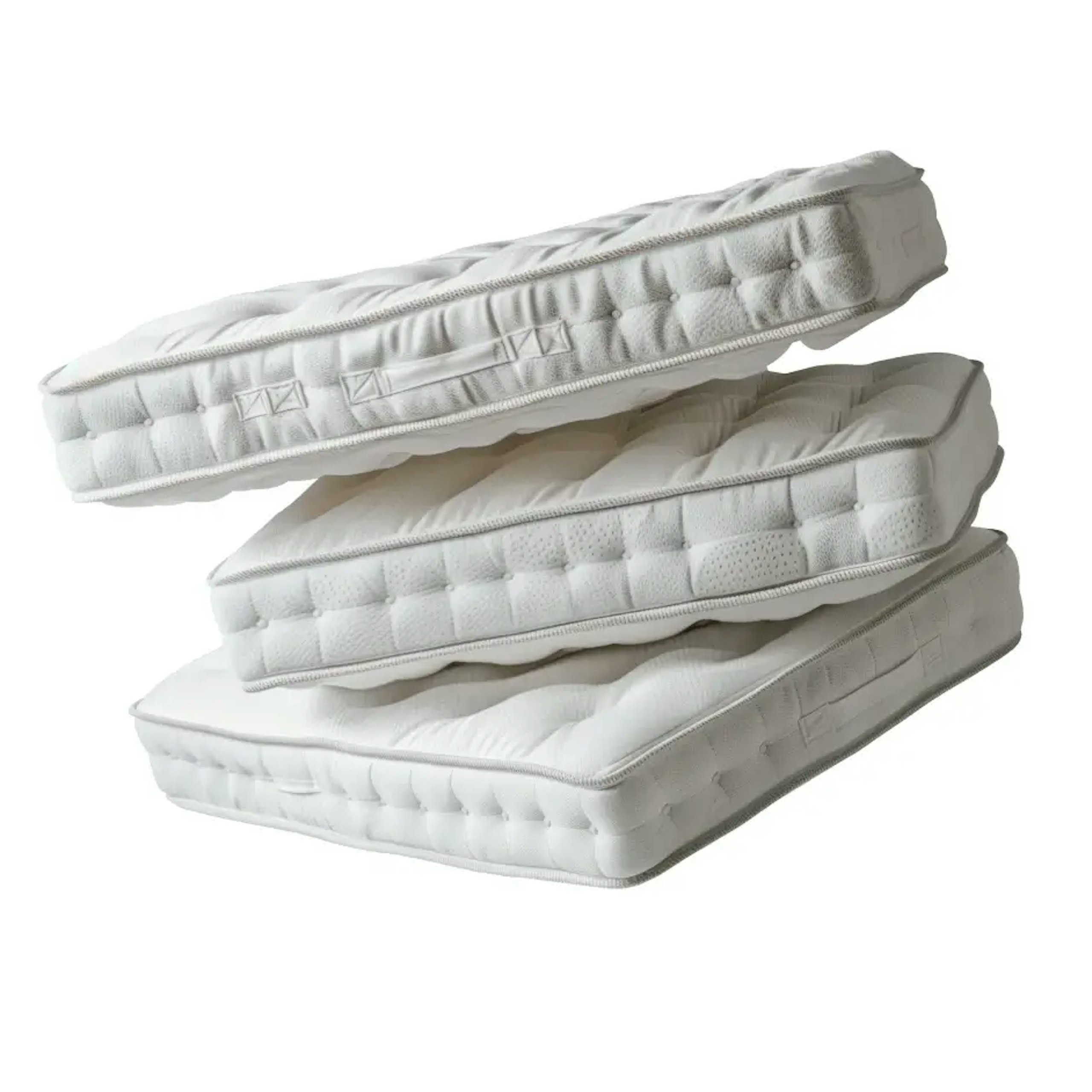 Mattresses Stacked On Top Of Each Other