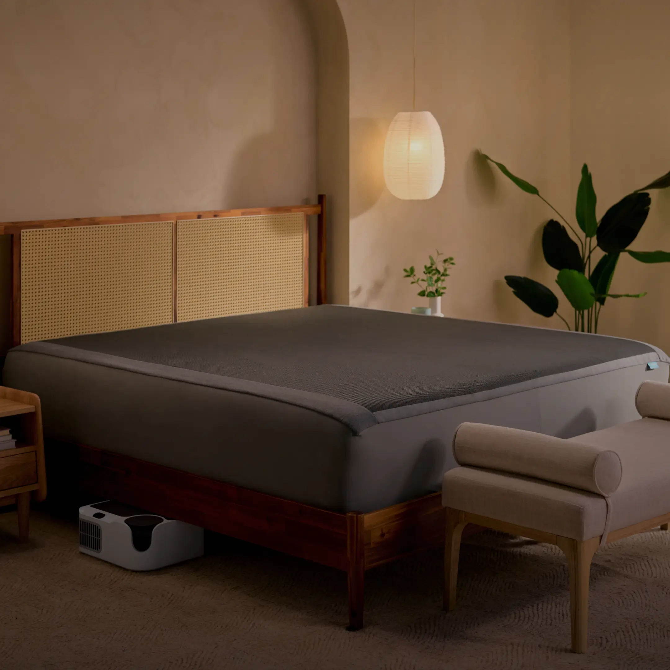 Bedroom with Chilipad Dock Pro cooling mattress topper installed on bed