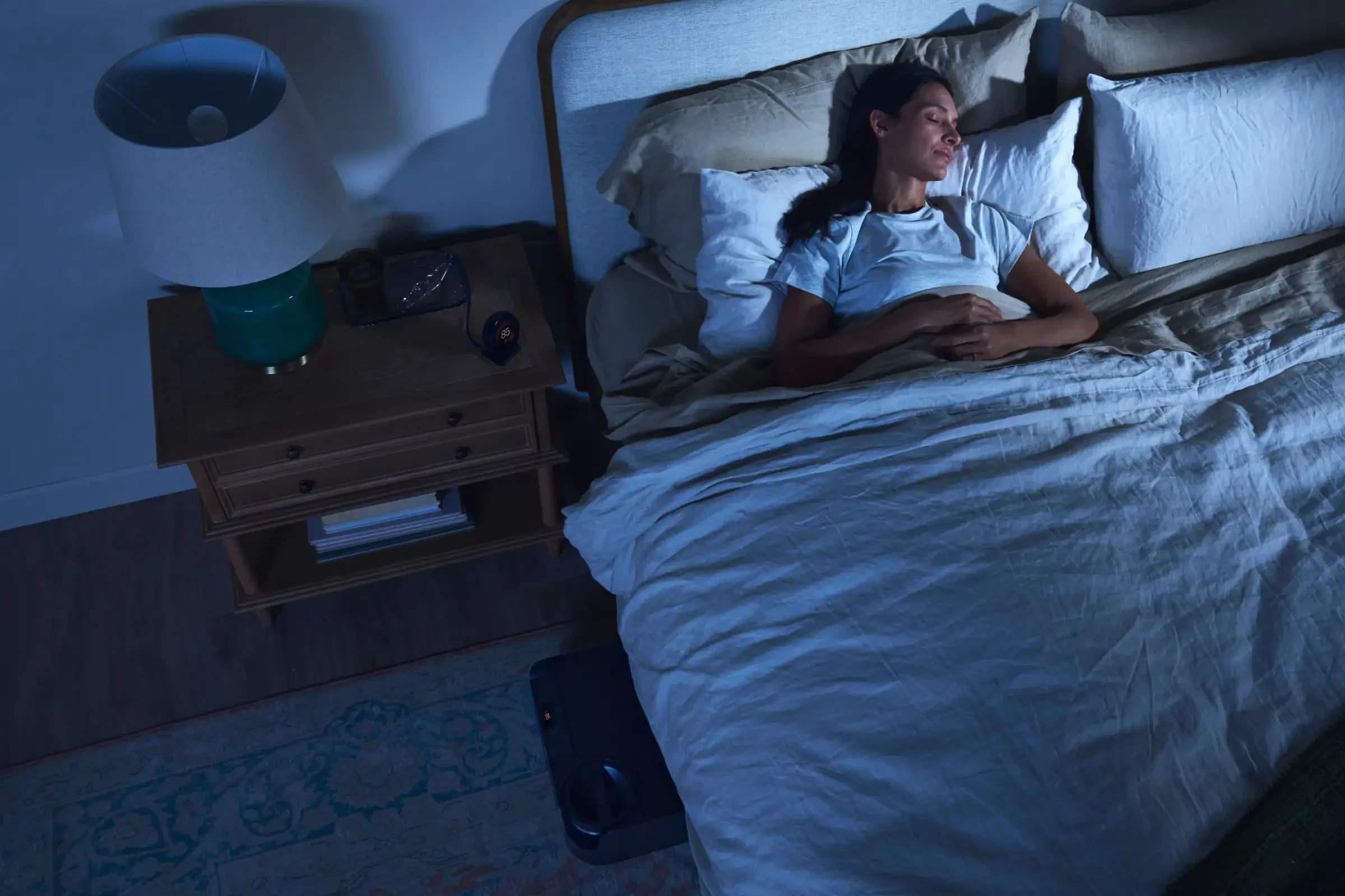 Women sleeping in a cooler bed with the Chilipad 2.0