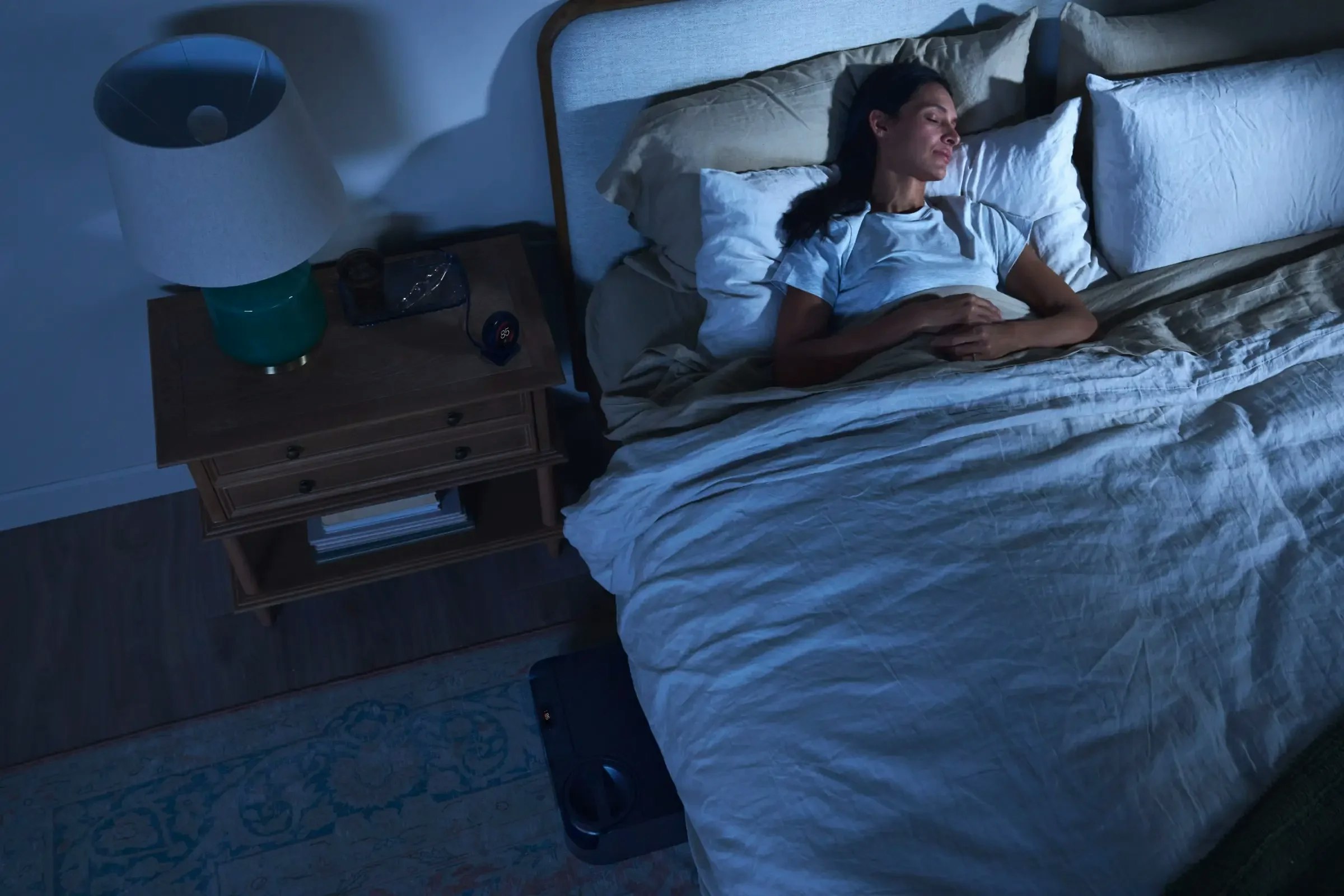 Woman Sleeping Cool with Chilipad 2.0 Women sleeping in a cooler bed with the Chilipad 2.0