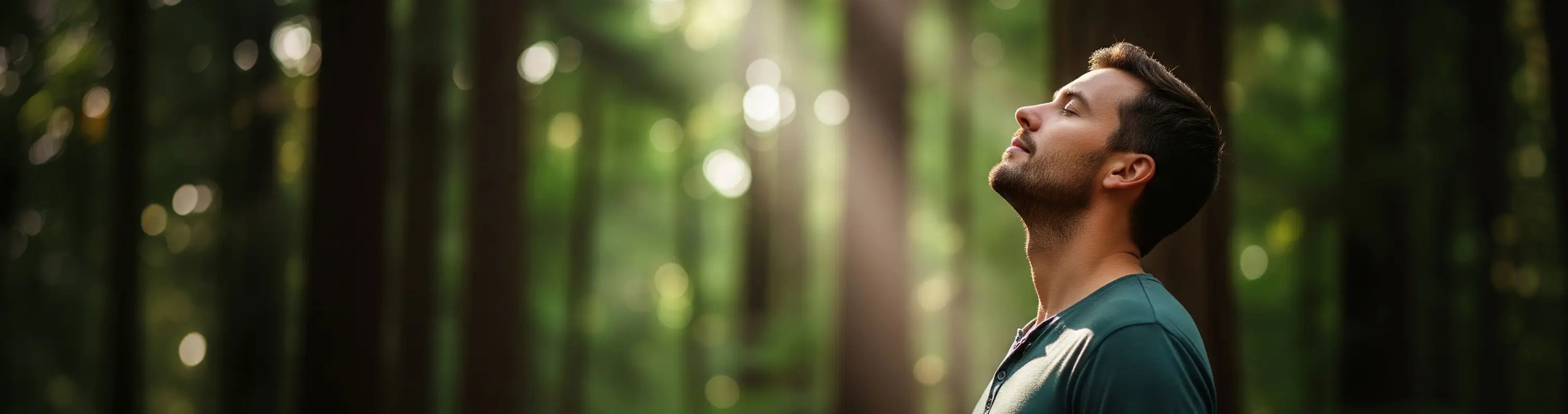 Man breathing calmly in a forest