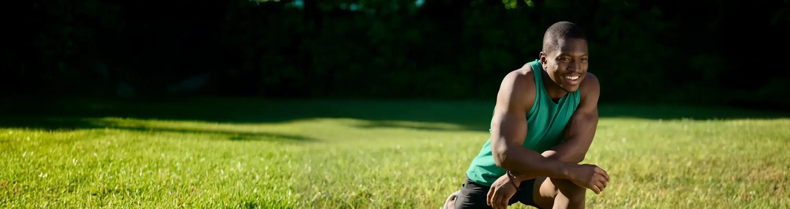 Athlete catching his breath outdoors