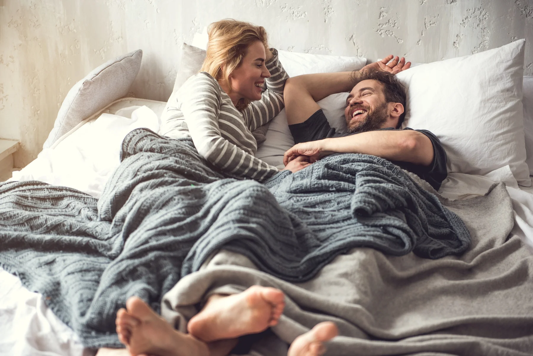 Couple sharing a bed