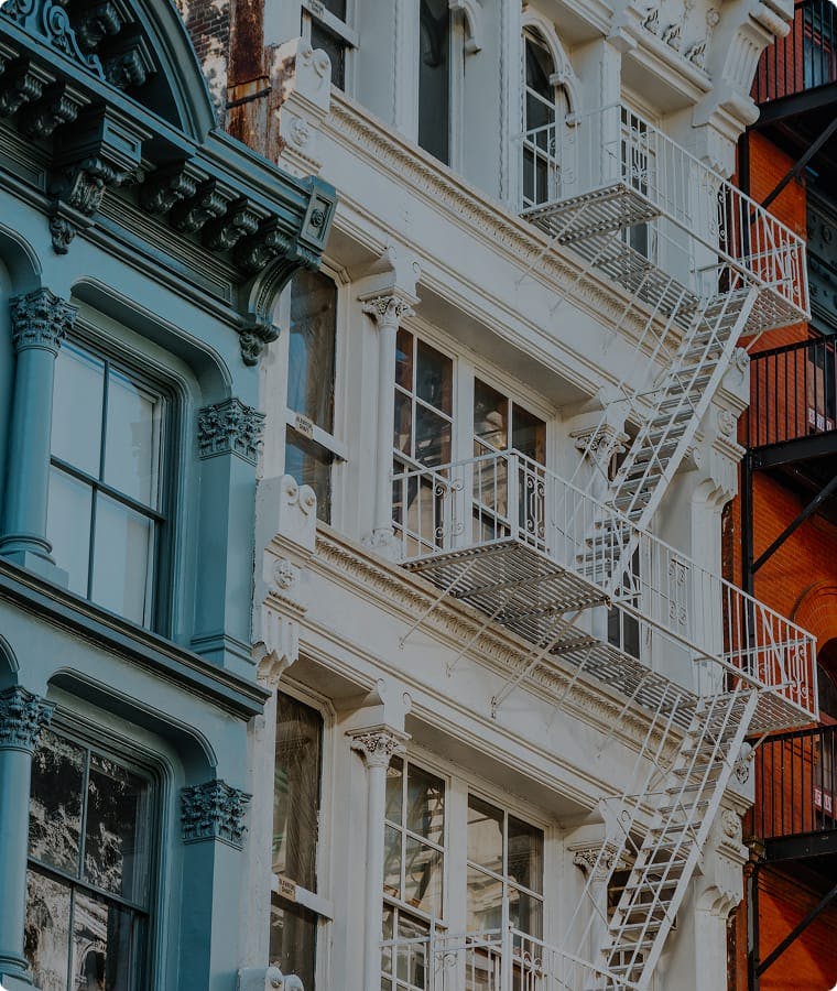 side of building with emergency stairs outside