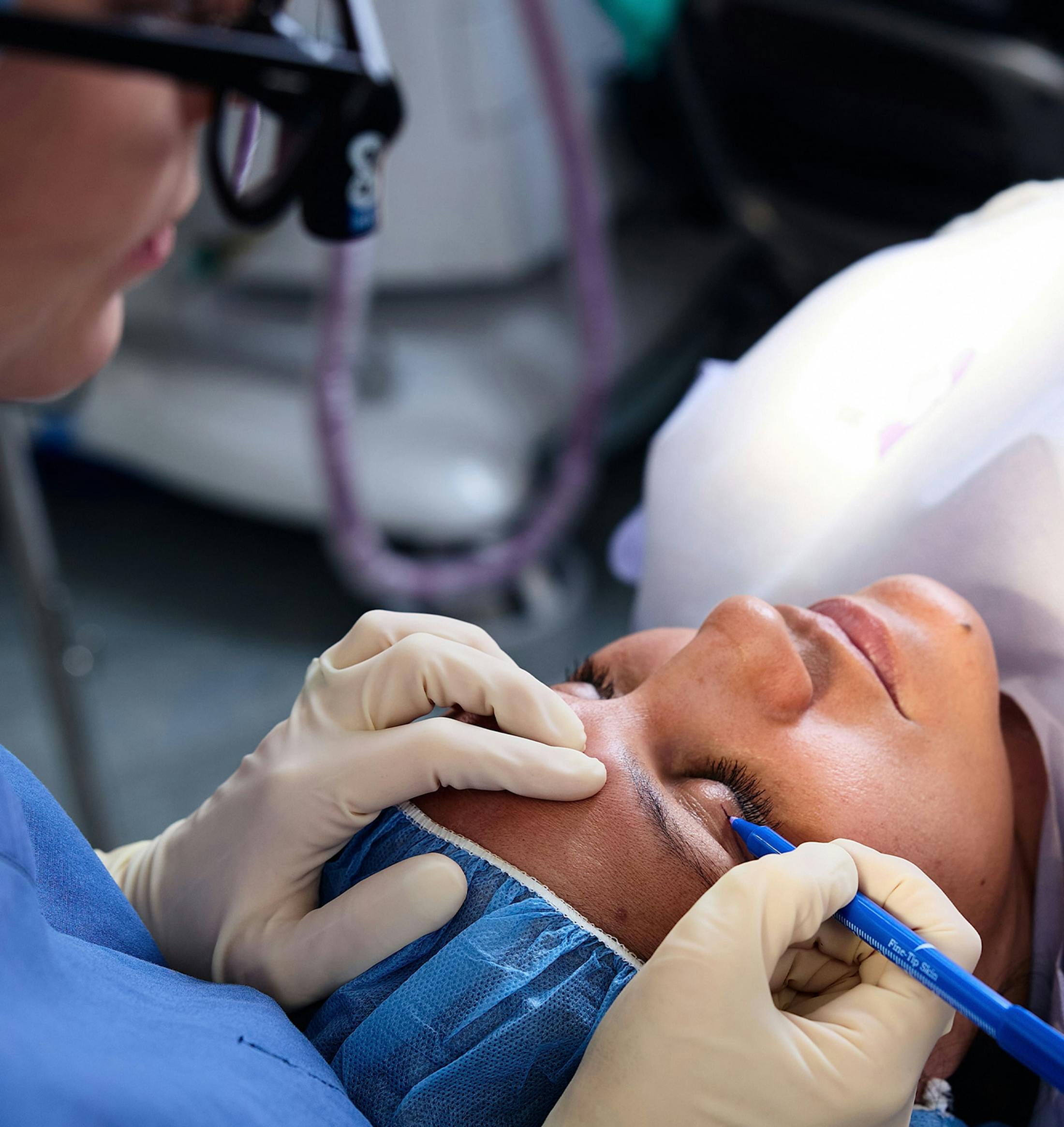 female patient getting eyelids done