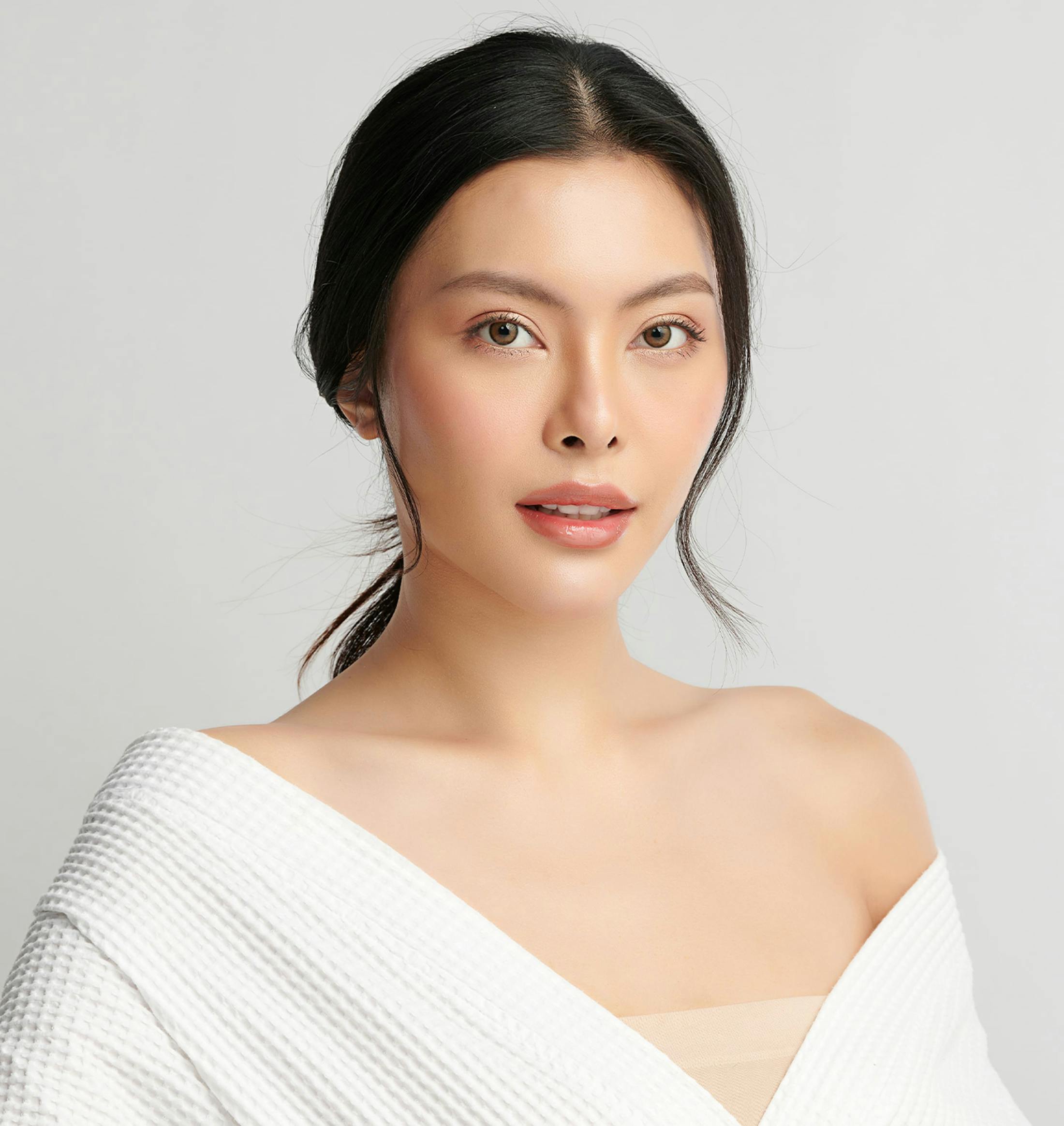 woman with her hair in a ponytail