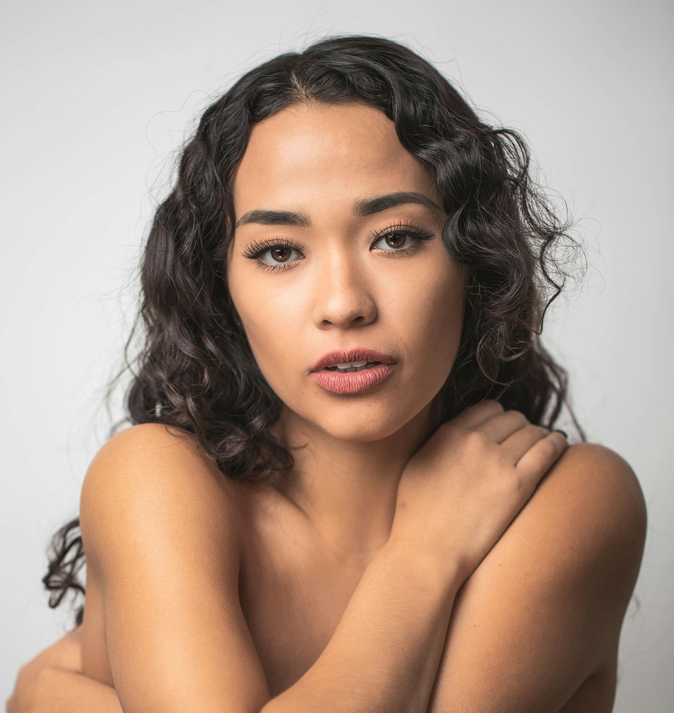 woman holding herself